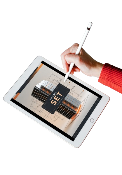 A white tablet angled on a white background, with a hand holding a white stylus pointing at the screen. The screen shows a 3D architectural model labeled 'TEAM SET'.